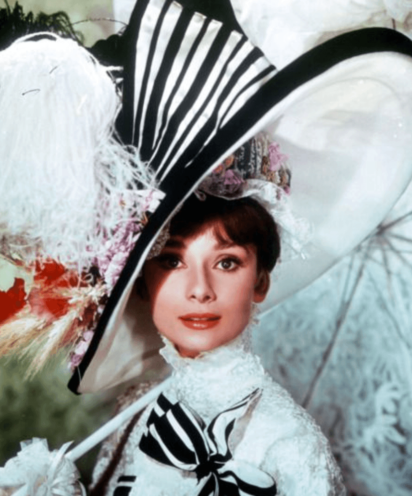 Audrey Hepburn in My Fair Lady wearing an iconic oversized hat